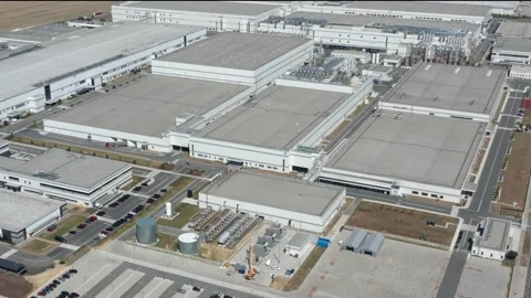A large modern factory for the production of electronic equipment and batteries Stock Footage 225664459
