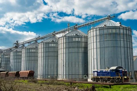 A large modern plant for the storage and processing of grain crops. Stock Photos