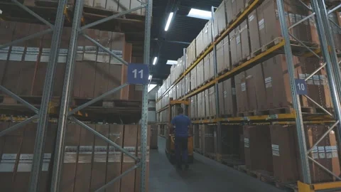 Large modern warehouse. Modern warehouse at the factory. Warehouse with boxes Stock Footage 309528278
