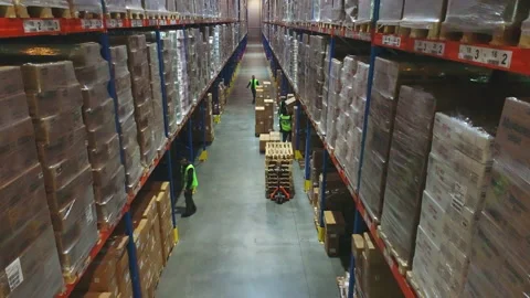 Large modern warehouse. Work in a modern warehouse. Forklift in a large Видео 171291051