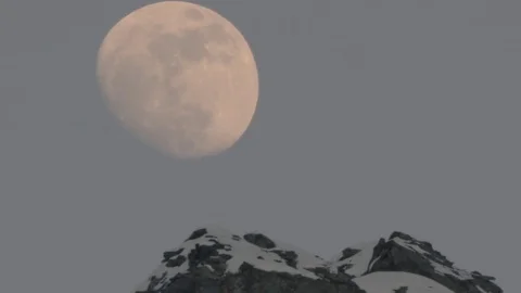 Large Moon Over Mountain Peak At Dusk Stock Footage 72744020