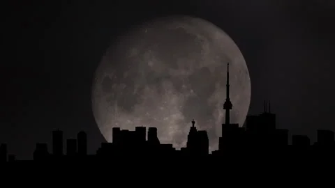 Large moon over North American city silhouette, Toronto downtown in Canada... Vídeos de archivo 341767230