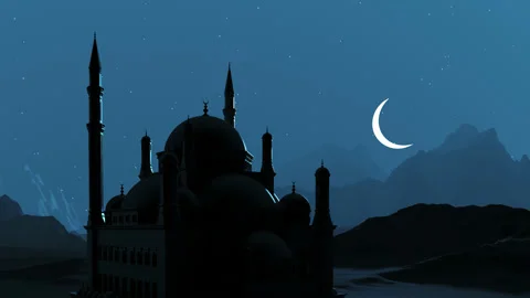 A large moon rises over the mosque during Ramadan. Stock Footage 236862474