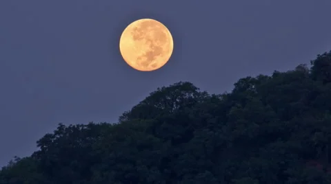 Large moon sets over the mountain Stock-Footage 42662978