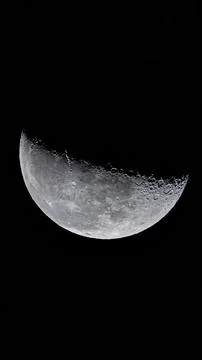 A large moon is in the sky, with a dark background 写真素材