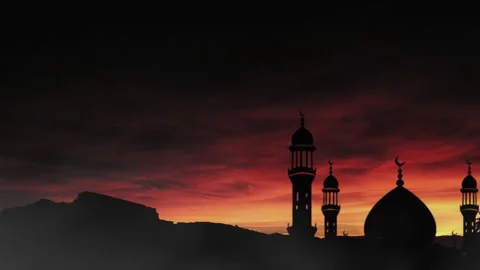 Large mosque silhouette with sunset background, Eid al-Fitr Stock Footage 325996829