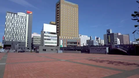 Large Mostly Empty Station Square in City Center of Asahikawa, Hokkaido, Japan Stock Footage 268842056