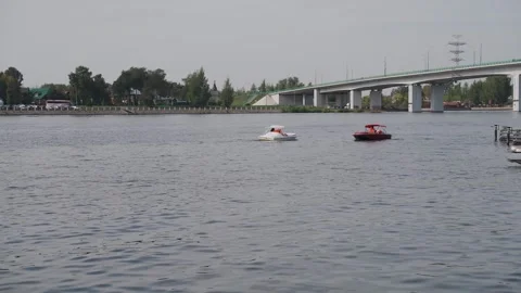 A large motorboat sails along the river Stock Footage 329249756