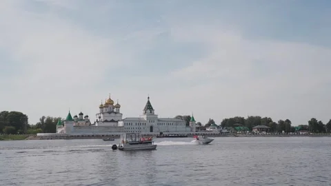A large motorboat sails along the river Stock Footage 329249771