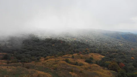 A large mountain in the background Stock Footage 129184714