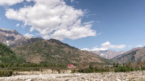 A large mountain in the background. Hamalay India Hyperlapse 4k Stock Footage 141706793