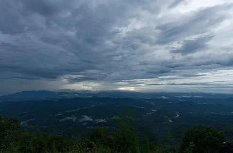 Large mountain under gloomy clouds from Doi Samer Dao, Nan, Thailand Stock Photos