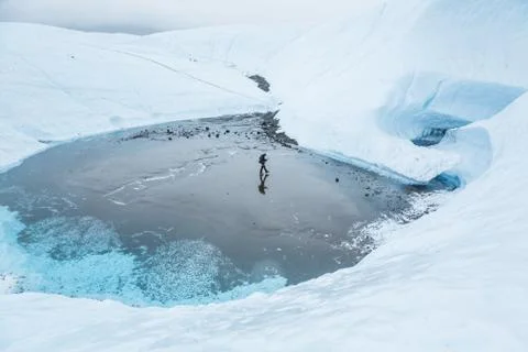 Large mud flat that used to be a blue pool or lake on the Matanuska Glacier i Stock Photos