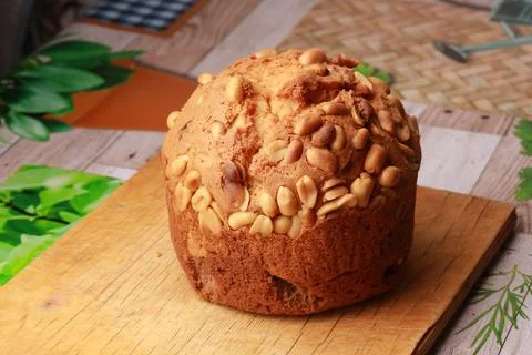 A large muffin with peanuts Stock Photos