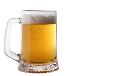 Large mug of light beer on white background Stock Photos