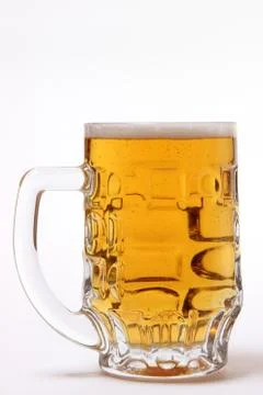 Large mug of light beer on a white background Stock Photos