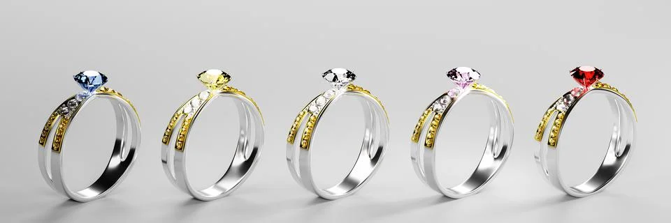 The large multi-color diamond is surrounded by many diamonds on the ring ma.. Stock Photos