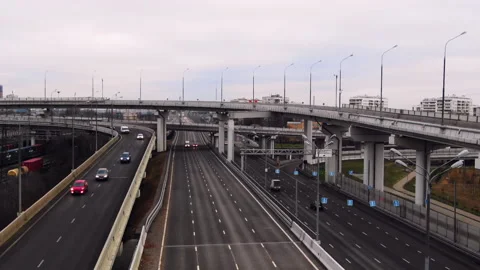 Large multi-lane pathway in the city. Cars are moving across the bridge. Road Video stock 155925764