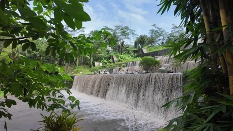 Large multi-level dam on a river, Grojogan Watu Purbo, Yogyakarta Vídeos de archivo 291652920