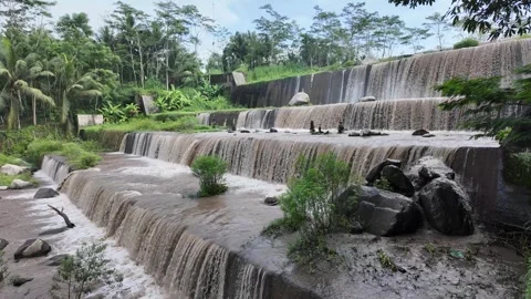 Large multi-level dam on a river, Grojogan Watu Purbo, Yogyakarta Vídeos de archivo 291661715