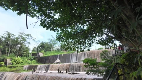 Large multi-level dam on a river, Grojogan Watu Purbo, Yogyakarta Vídeos de archivo 291666819