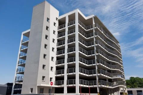 Large multi-level parking against the blue sky Stock Photos