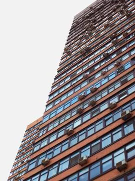 Large multi-storey house of red brick in Moscow. Stock Photos