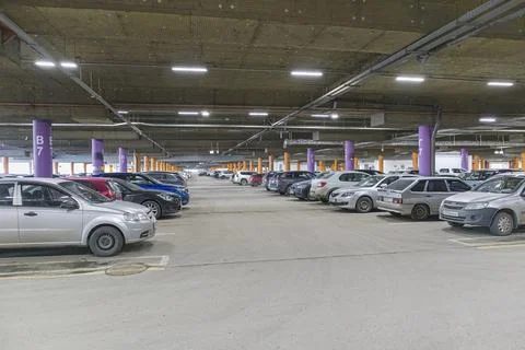 Large multi-storey underground car parking garage. underground car parking 스톡 사진