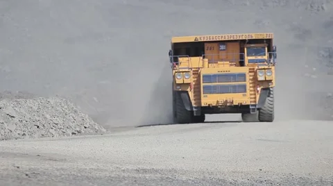 A large multi-ton dump truck with coal into open pit mine Stock Footage 45807889