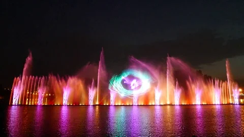 Large musical colorful fountain, festive laser light show at holiday celebration Stock Footage