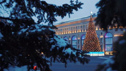 Large New Year tree glowing with colorful lights on the street Stock Footage 119491484
