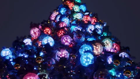 Large New Year tree glowing with colorful lights on the street Stock Footage 119491523