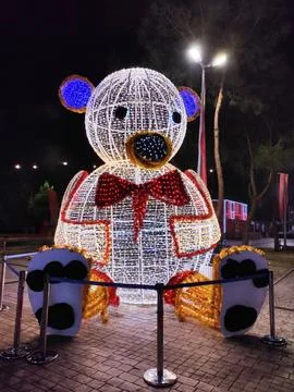 A large New Year's light installation in the form of a teddy bear Stock Photos