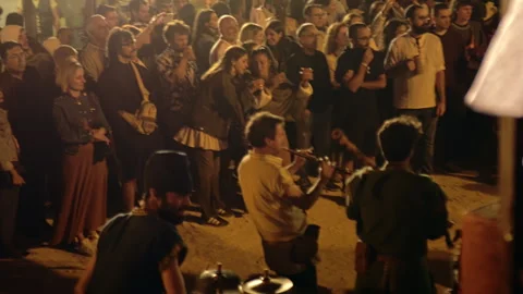 Large Night Crowd Gathered Around Street Musicians Performing in Obidos Stock-Footage 340982003