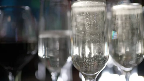 A large number of Bacals with sparkling wine. the concept of the holiday was  Video stock 170864453