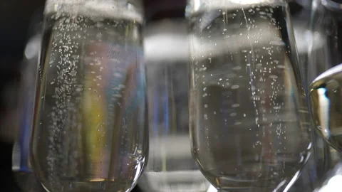A large number of Bacals with sparkling wine. the concept of the holiday was  Stock-Footage 170864517
