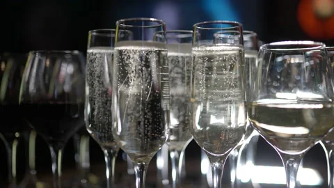 A large number of Bacals with sparkling wine. the concept of the holiday was  Stock Footage 170864579