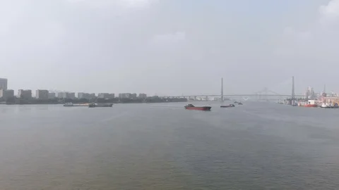 A large number of cargo ships sailing along the river Video stock 118036792