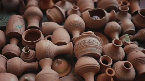 A large number of ceramic dishes and jugs on the plane, slow motion video Video stock 155688980