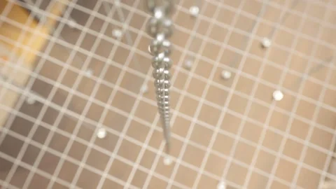 Large Number of Chained Hooks are Raised by Motorized Hoists Stock Footage 262111646