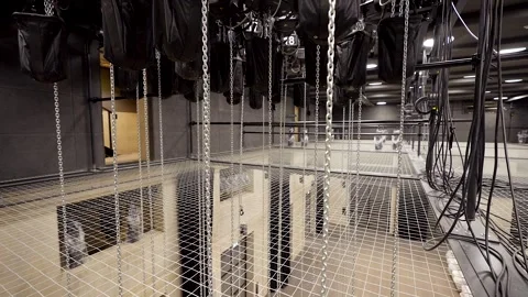 Large Number of Chains are Lowered by Motorized Hoists Stock Footage 262111598