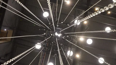 Large Number of Chains are Raised by Motorized Hoists Stock Footage 262111742