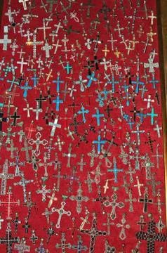 Large number of crosses in display case for sale... Stock Photos
