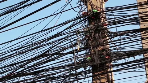 Large number of electrical wires on electric post Stock Footage
