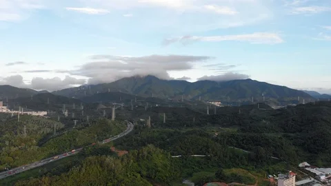 A large number of high voltage power lines in the mountains. Stock Footage 118144141