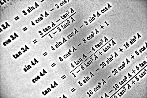 Large number of mathematical formulas on a white background HDR Stock Illustration