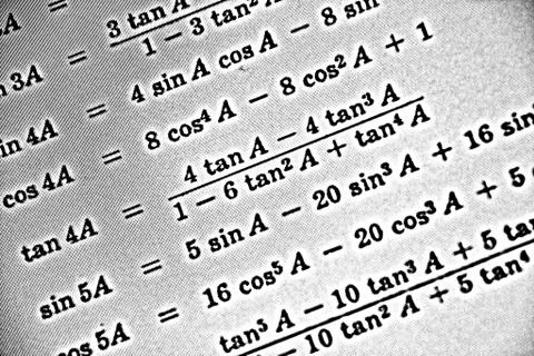 Large number of mathematical formulas on a white background HDR Stock Illustration