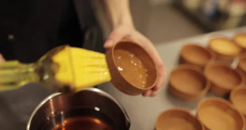A large number of mini-tarts are laid out in even rows Stock Footage 253408021