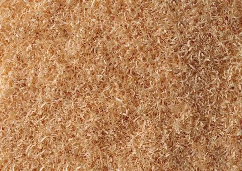 A large number of small sawdust close-up in production Stock Photos