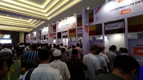 Large number of visitors queuing up Infront of the registration counter for e Stock Footage 222407513